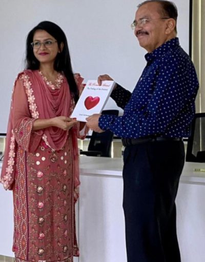 Presenting the Book The Romantic Brand to My Student at Dhaka